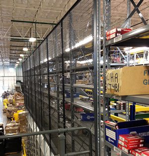 RackBack Safety Panels on Backs of Warehouse Shelving to Prevent Items from Falling Into Employee Aisle Ways