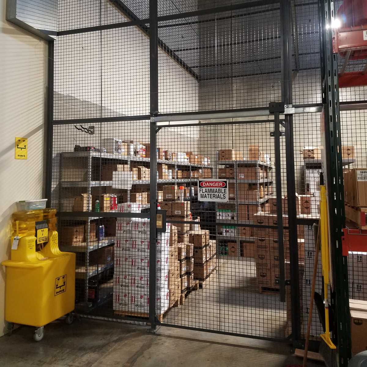 floor to ceiling black aerosol storage cage with security door and lock