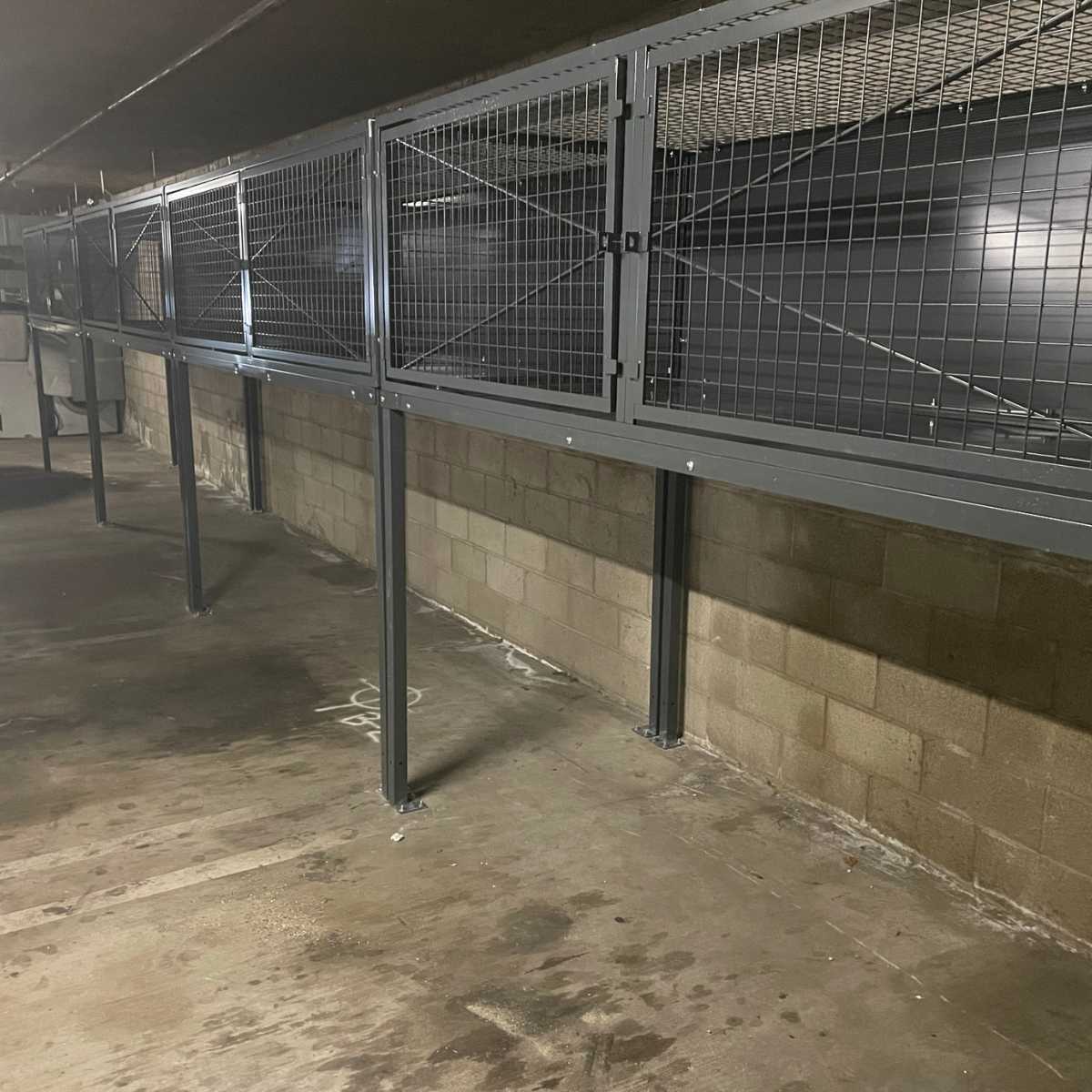 mesh storage bins secured above parking space