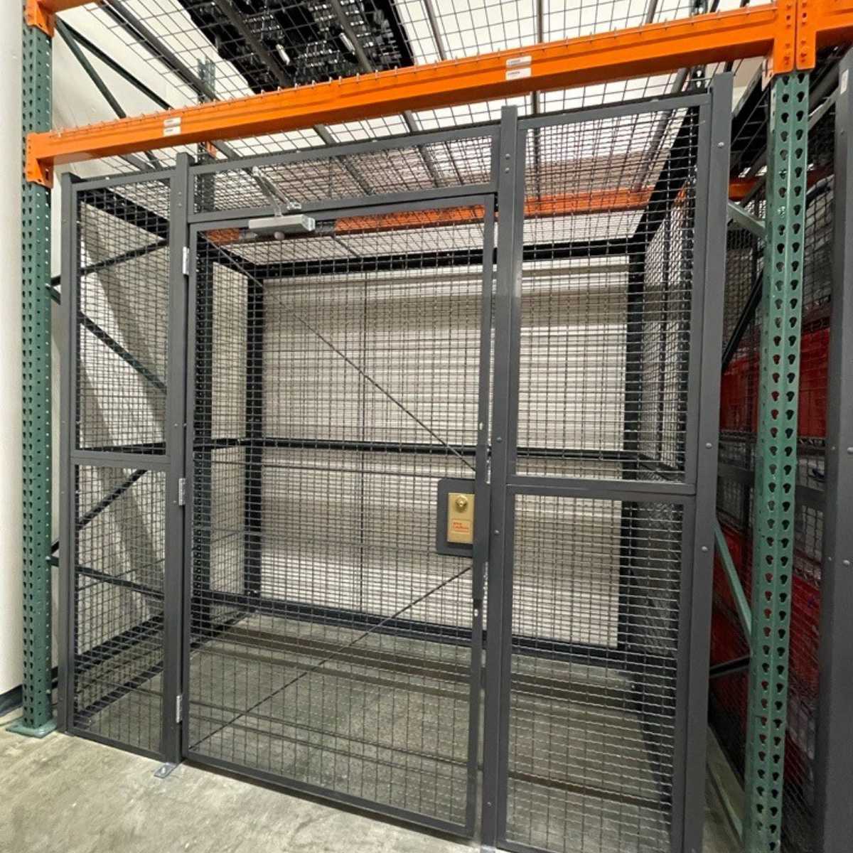 gray mesh cage with lockable security door and orange ceiling joists