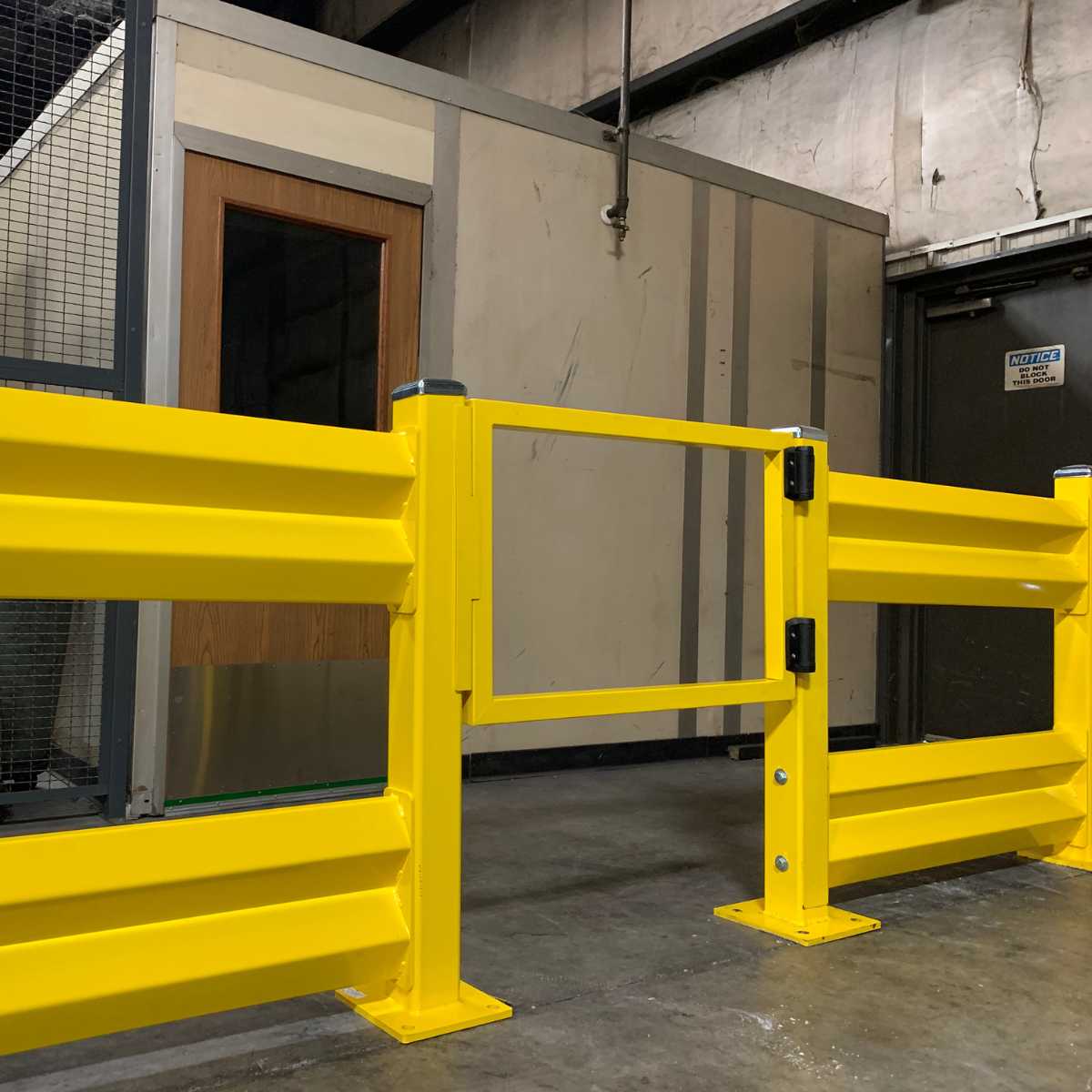 yellow double guardrail with hinged door